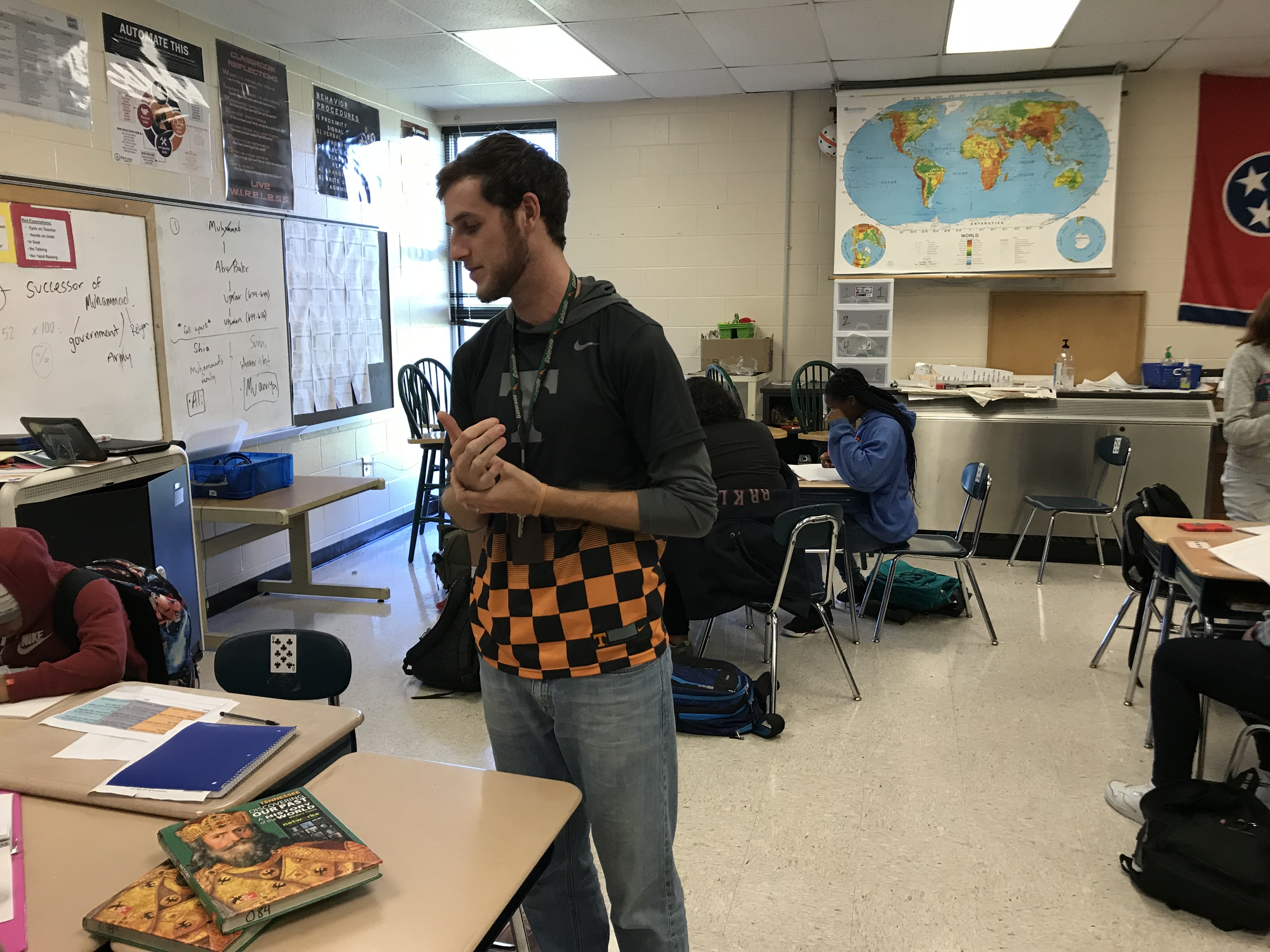 Northwest Middle School teacher Riley Scheyder visits with students on Oct. 19, 2018. 